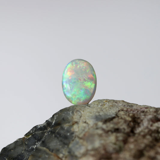 Oval-shaped Coober Pedy Crystal Opal (#1064)